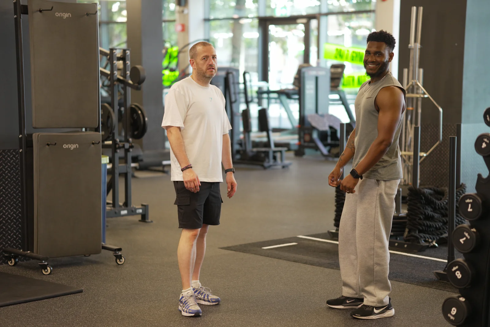 Josh Silvera working with a client in the gym